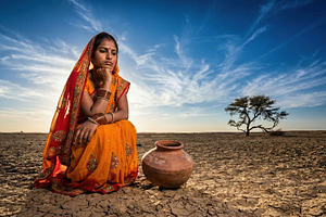Young Indian Woman in Arid Desert, a Person Photo by Virgo Studio