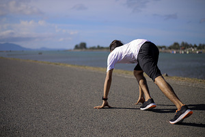 Athlete Sprinting on Coastal Road, a Sports & Recreation Photo by bastera