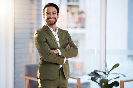 Professional portrait of asian man in office with leadership, business mindset and happy career with designer fashion. Face of a proud and confident Japanese manager, boss or entrepreneur with smile, a Photo by Peopleimages.com