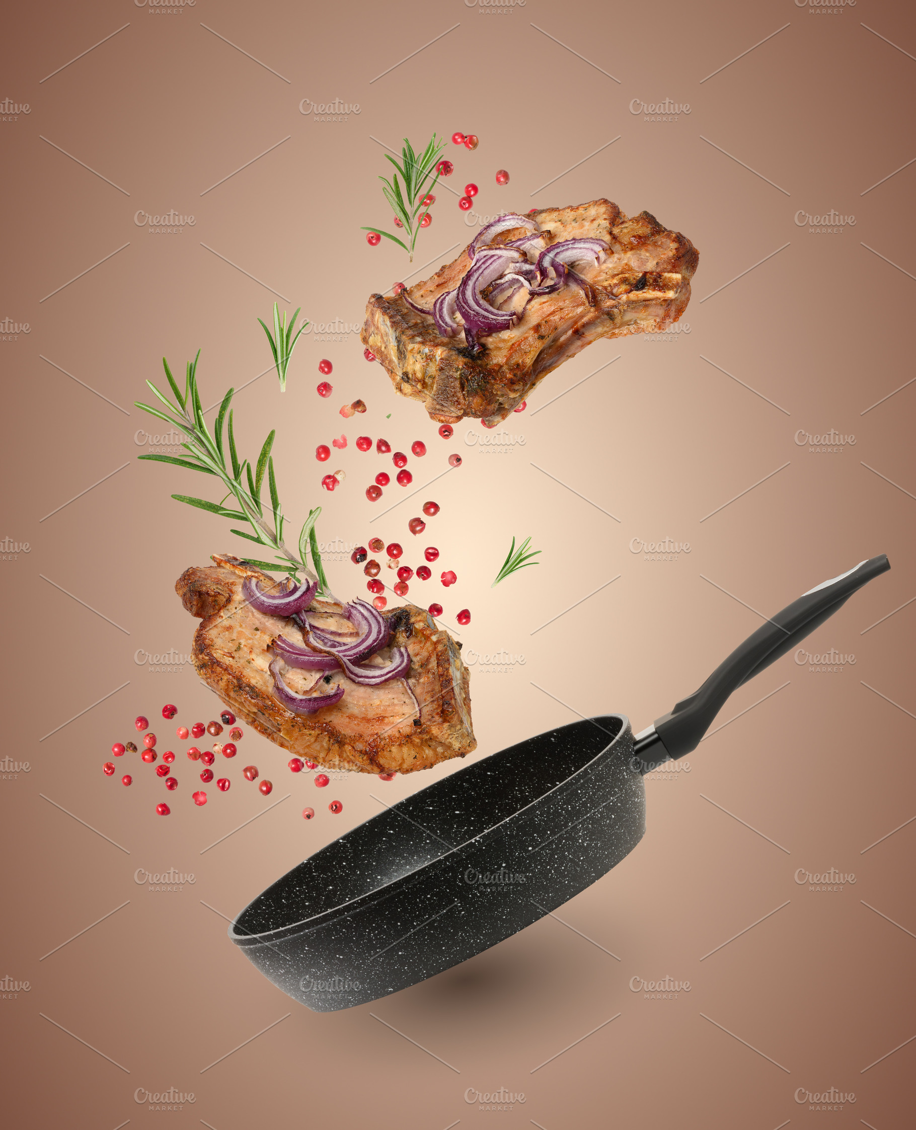 A levitating arrangement of two grilled pork steaks with red oni, a Food & Drink Photo by ndanko
