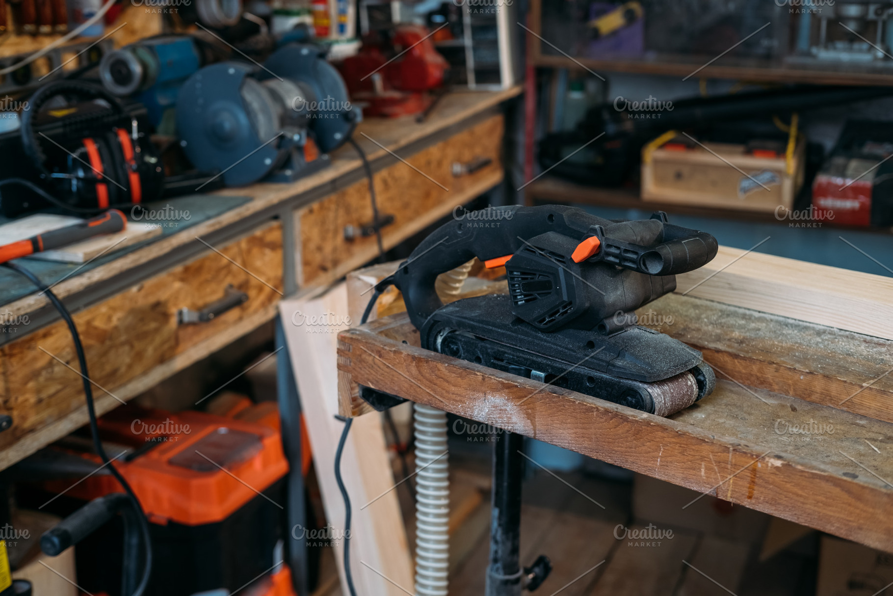 Carpentry equipment belt sander woodworking tool, an Industrial Photo by Photo Drive Studio