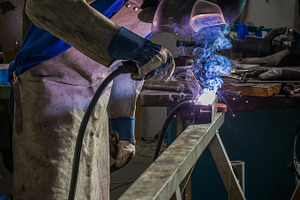 Welder featuring industry, metal, and welding