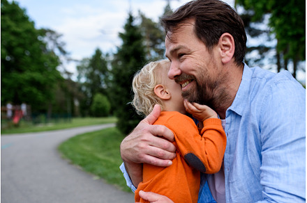 Portrait of dad and child enjoying, a Nature Photo by HalfPoint