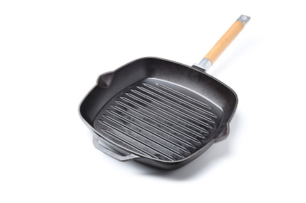 Pan grill isolated on white background, close up, a Food & Drink Photo by AtlasStudio PRO