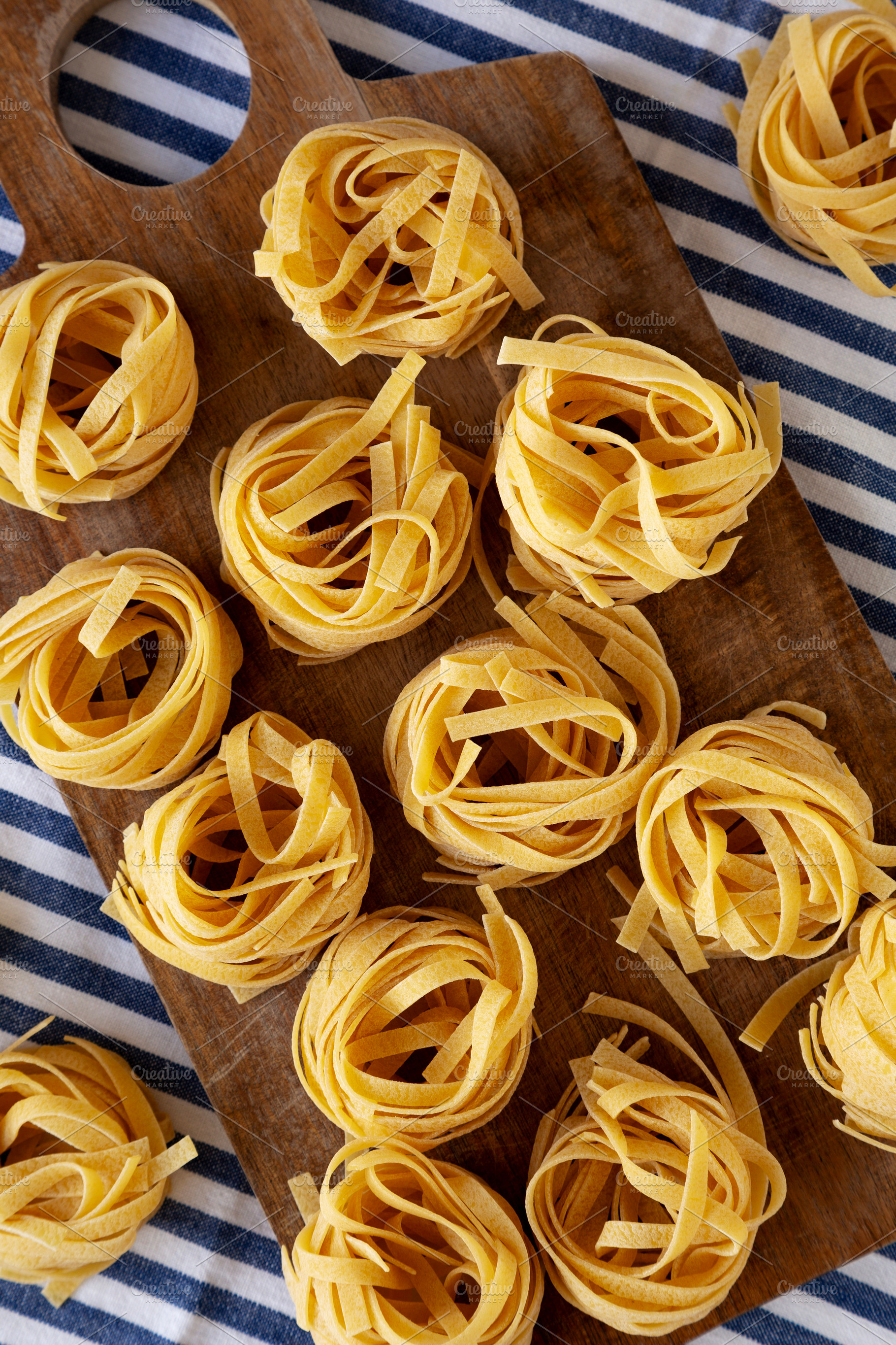 Raw Organic Dry Tagliatelle Pasta Ready to Cook, a Food & Drink Photo by LiudmylaChuhunova