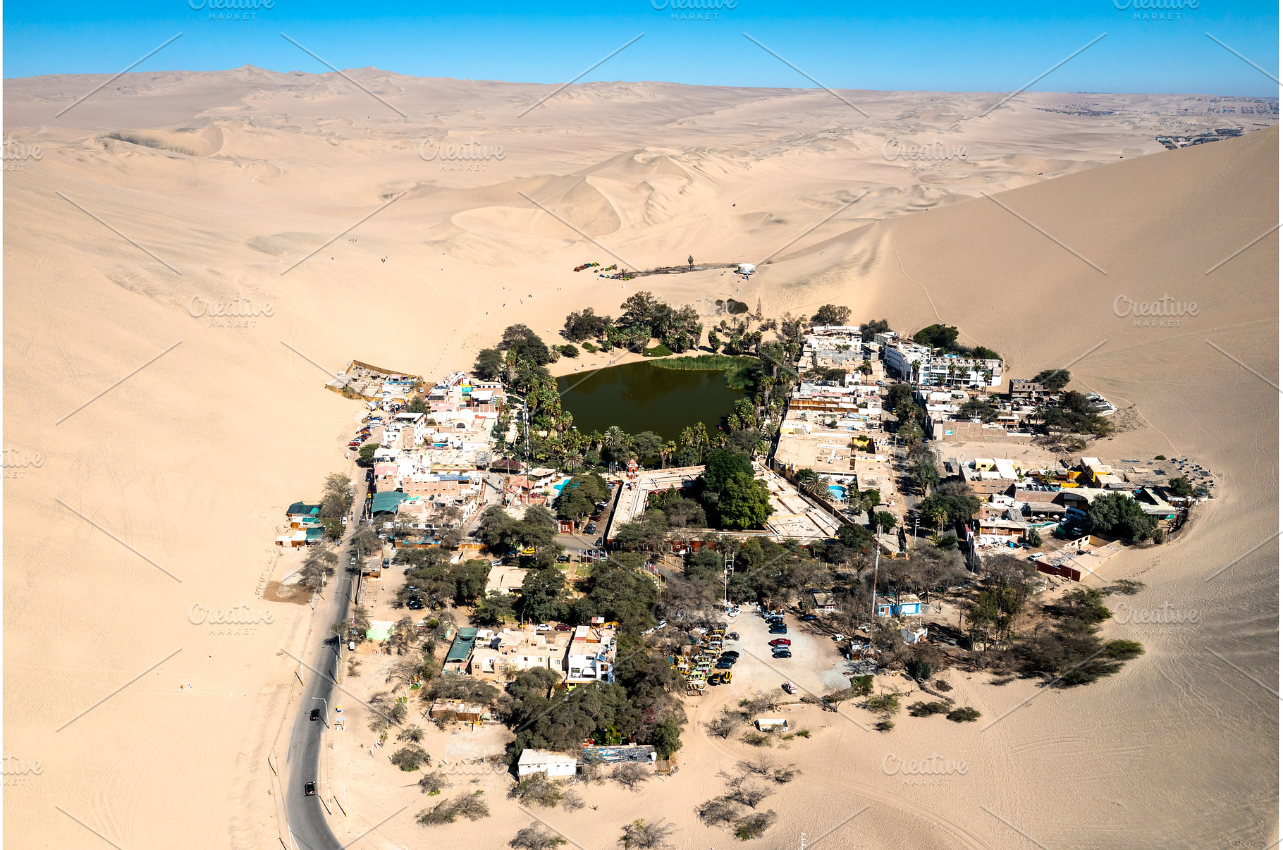 Aerial view of the Huacachina Oasis, a Nature Photo by Leonid Andronov