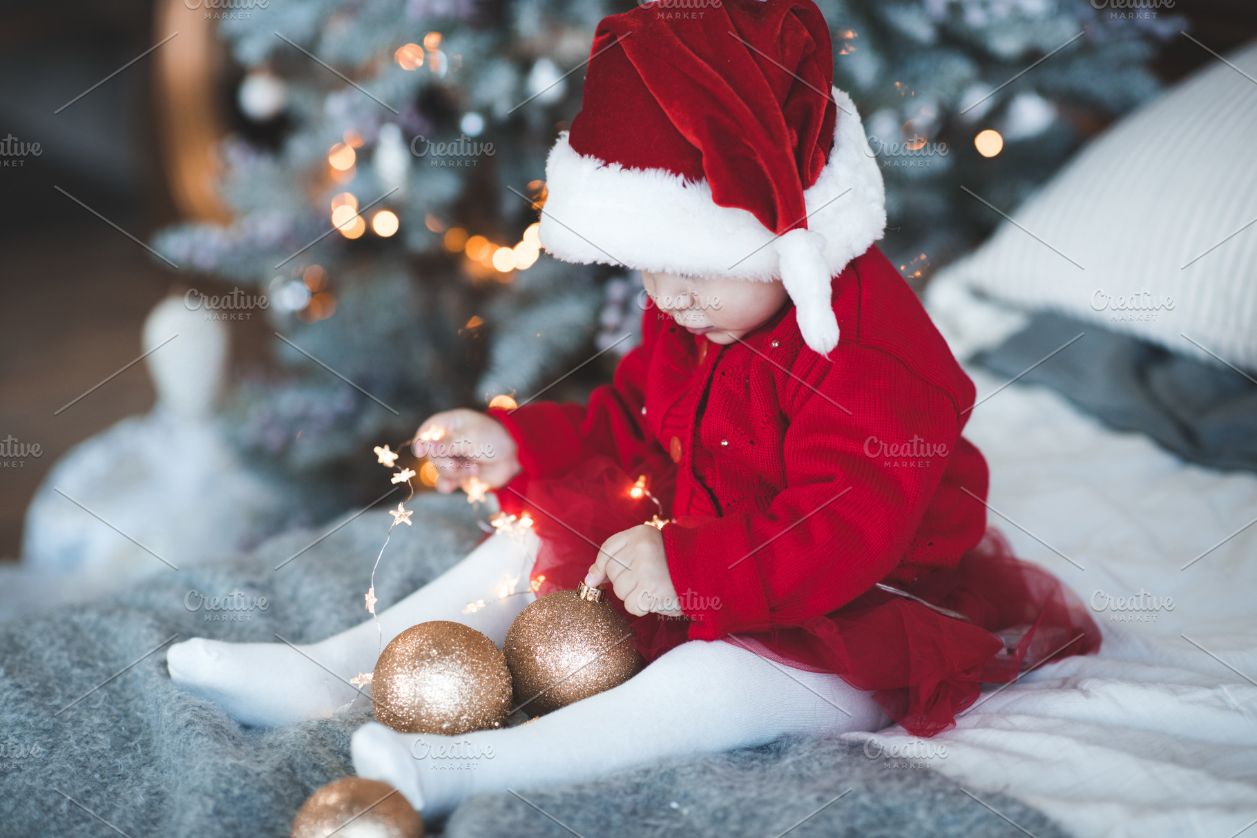 Cute baby over Christmas decor, a Holiday Photo by morrowlight