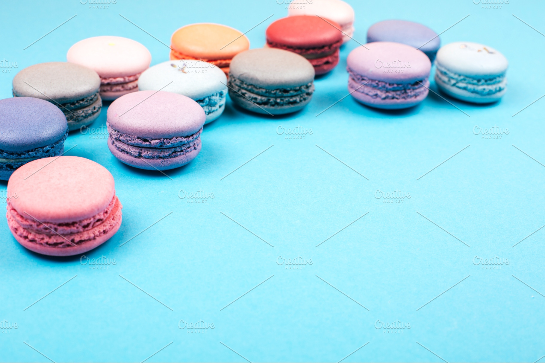 Pink macaron in front of assorted, a Food & Drink Photo by Anna Efetova