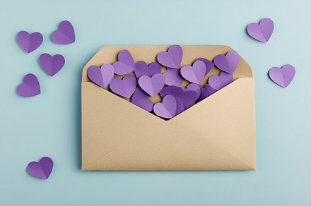 Valentines letter envelope with paper hearts, a Holiday Photo by AlyaAnd