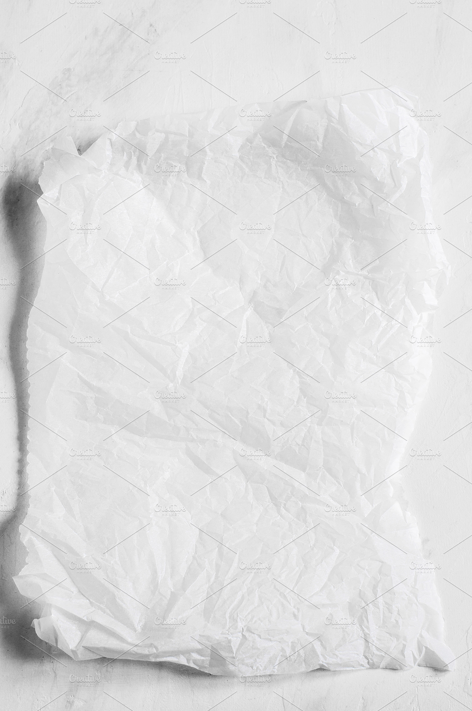 White empty crumpled baking paper., an Abstract Photo by Galiyah Assan