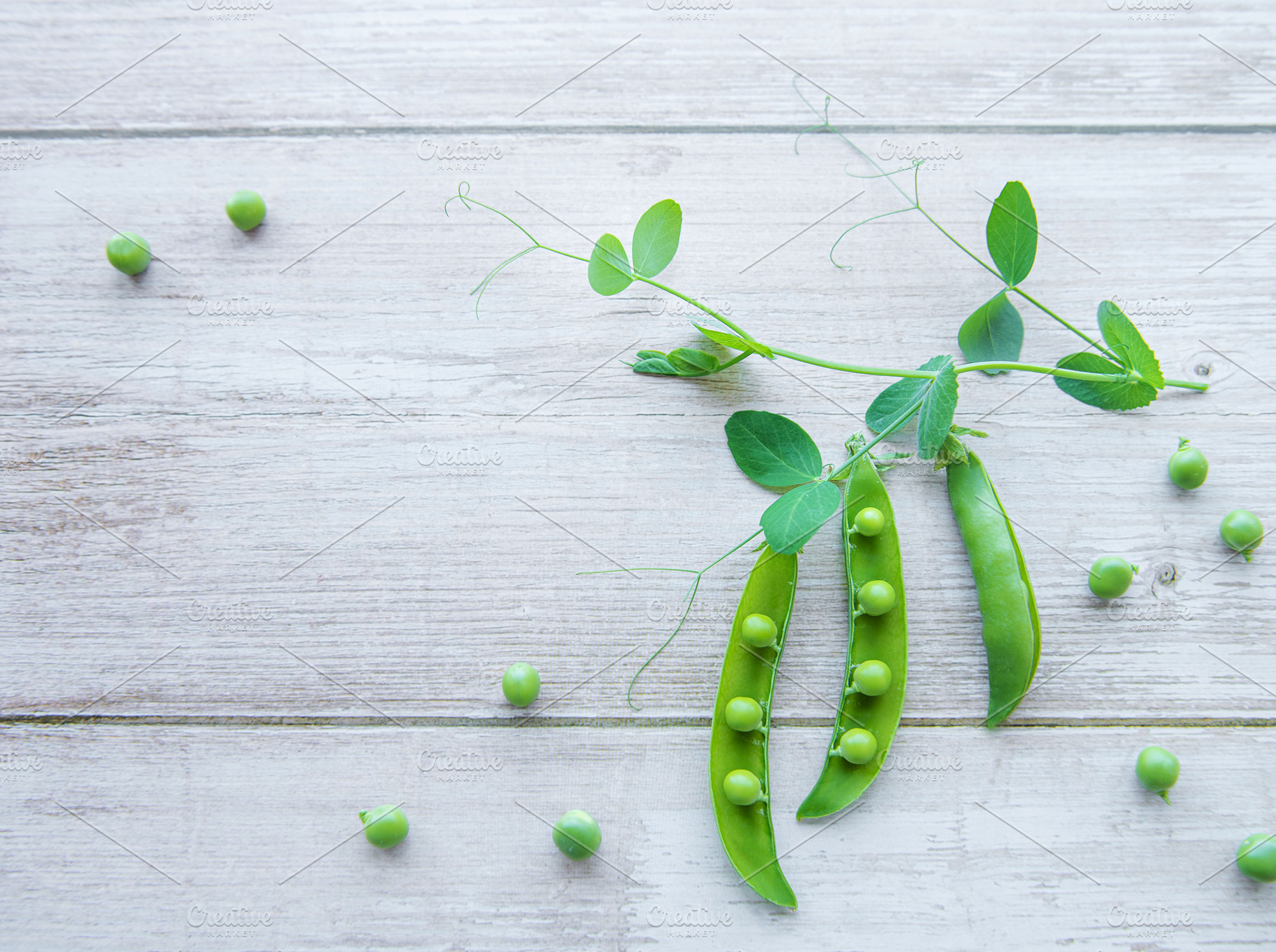 Green peas with leaves, a Food & Drink Photo by Olena Rudo