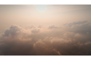 Sun shining through clouds covering, a Nature Photo by Goinyk