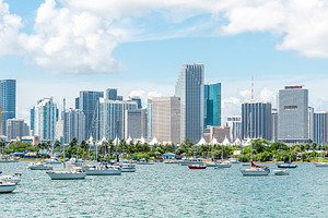 Miami skyline with yachts, boats, an Architecture Photo by Maria Kray