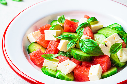 Watermelon salad with feta, cucumber, a Food & Drink Photo by vaaseenaa