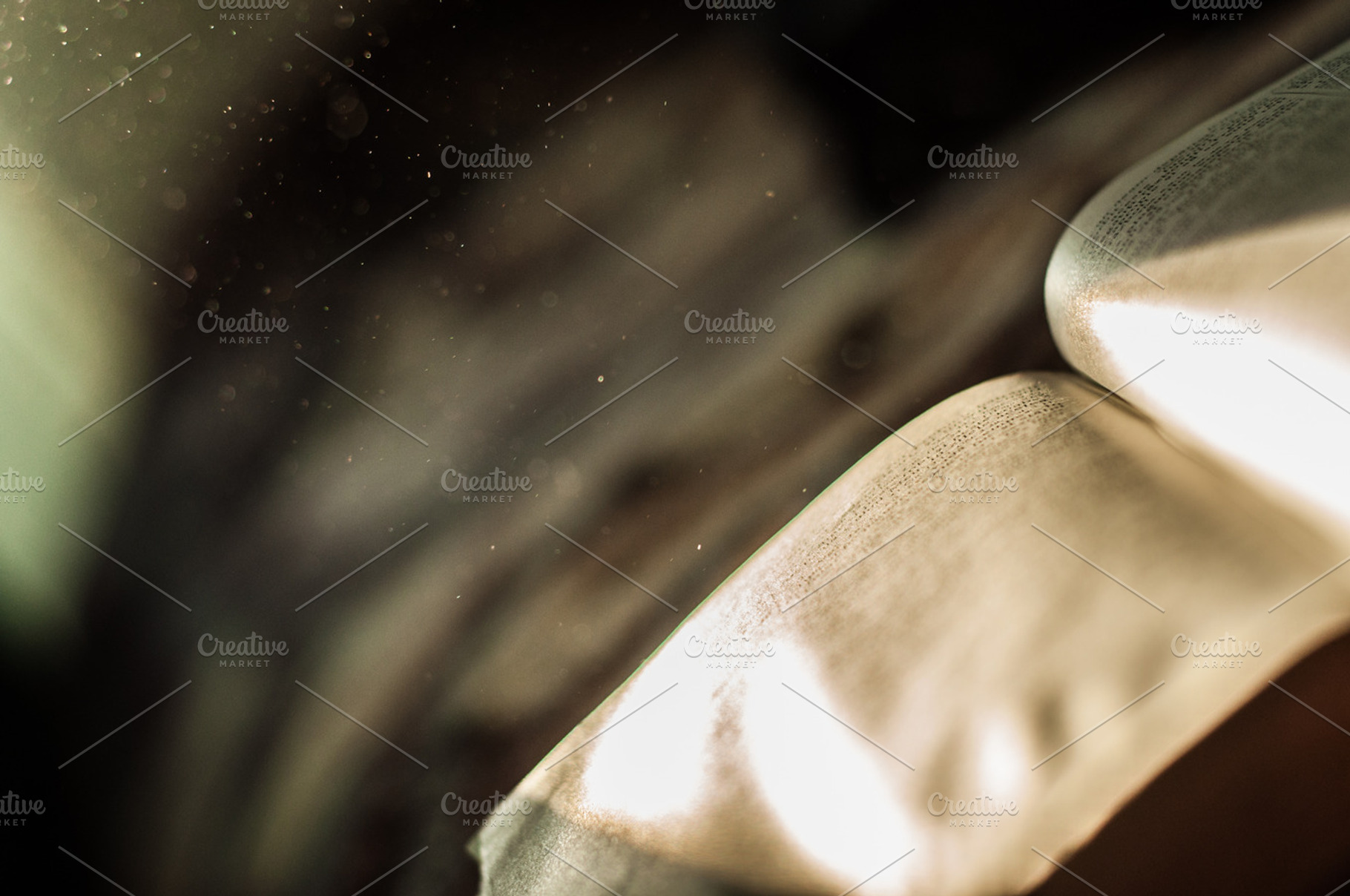 Open bible stock photo containing dust and particle