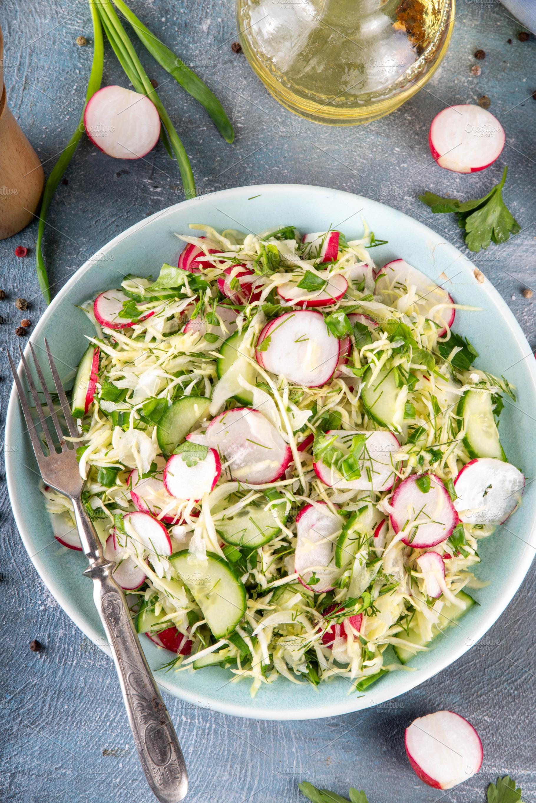 Spring cabbage salad, with cucumber and radish, a Food & Drink Photo by Rimma