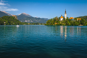 Travel destination with famous lake, an Architecture Photo by Alpine Dreams