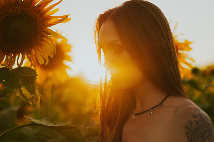 woman in a field of sunflowers