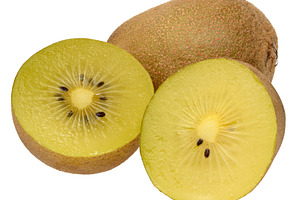 A whole golden kiwi fruit and its two juicy halves with bright y, a Food & Drink Photo by ndanko