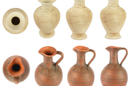 Set varied earthenware jugs isolated on white