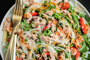 Fresh Tuna Salad with Onions and Cherry Tomatoes. Italian Mediterranean Cuisine