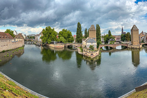 Panoramic view of Ponts Couverts towers and canal in Strasbourg, an Architecture Photo by GoodGoods