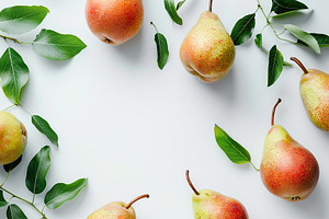 Red pears with leafs and copyspace for text on white background, a Food & Drink Photo by AlyaAnd