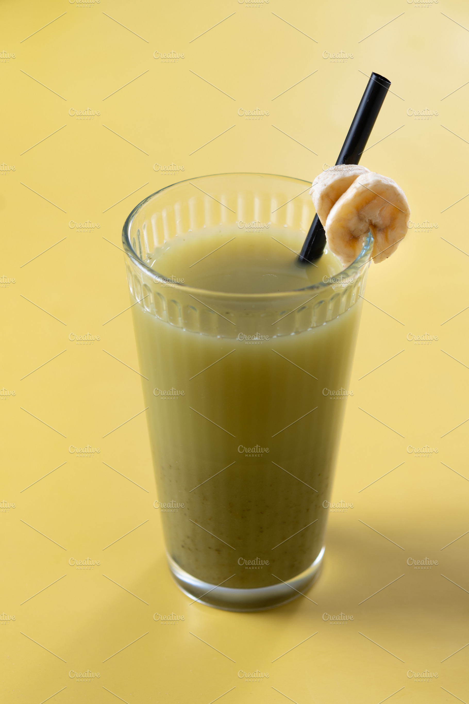 Green smoothie with spinach,banana, apple, and lemon, a Food & Drink Photo by etorres69