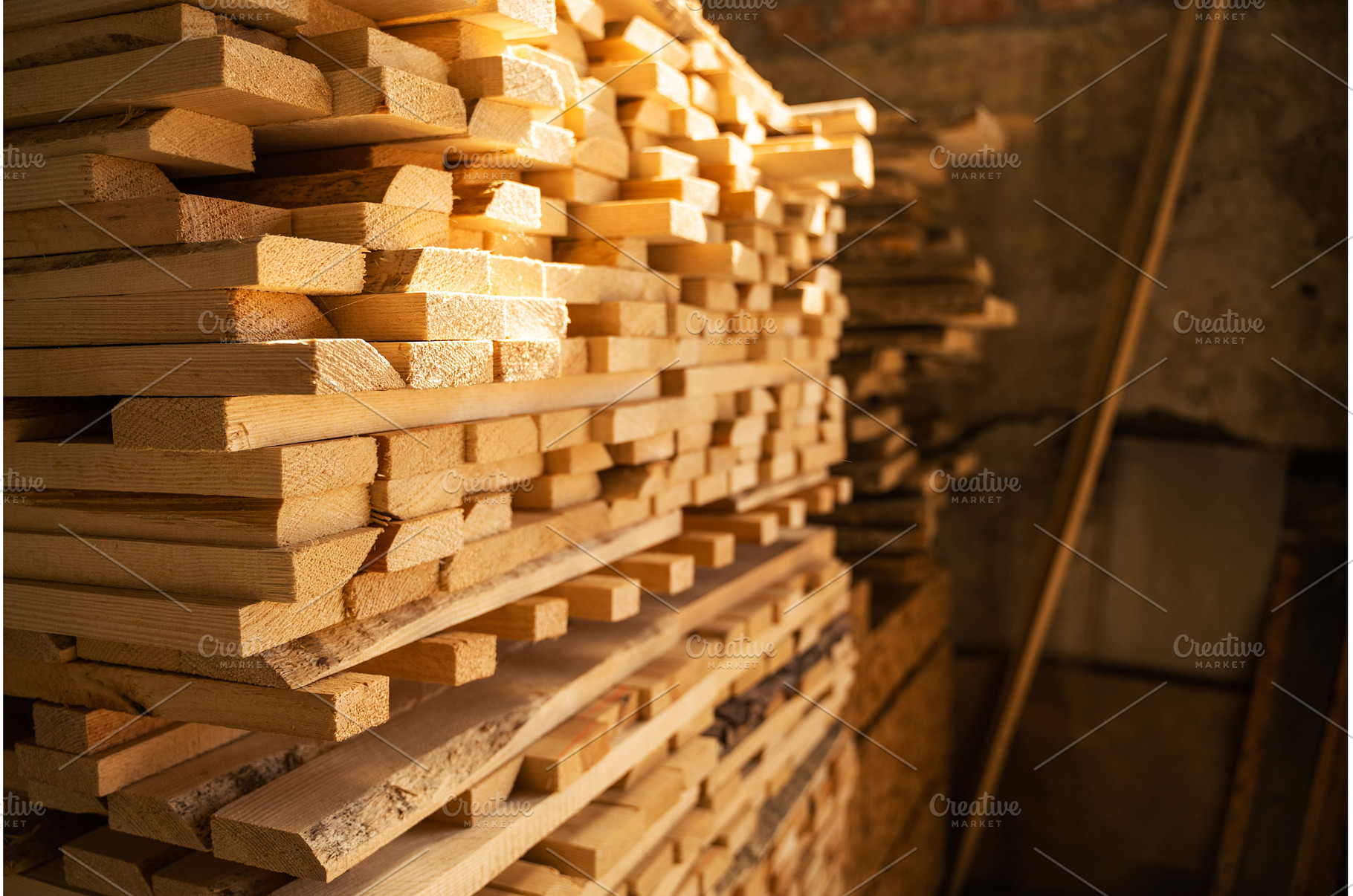 Dry wooden planks stacked inside, an Industrial Photo by volodymyrshtun13795
