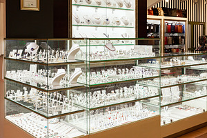 Shiny jewelry shop glass display, a Business Photo by BOOCYS