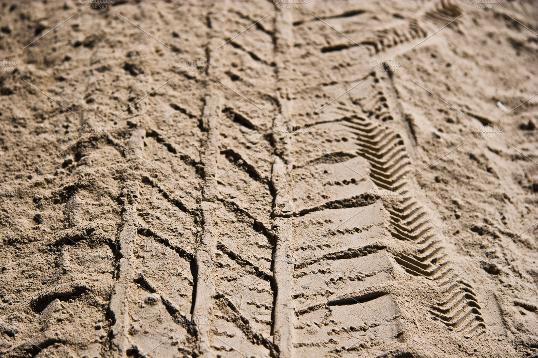Tire tracks in sand photo stock photo containing tire and tracks, an Abstract Photo by Tien Frogget