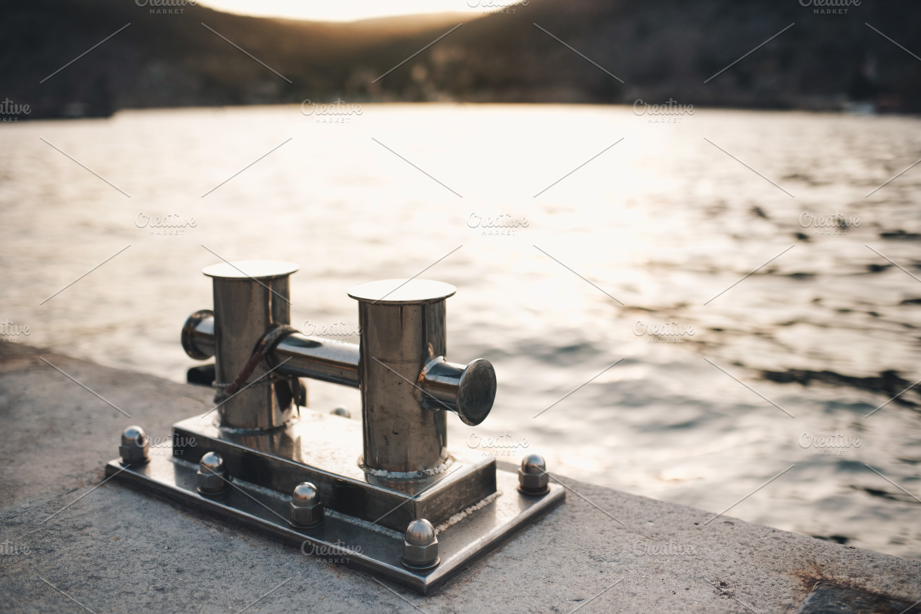 Yacht bollard over sea background, a Nature Photo by morrowlight