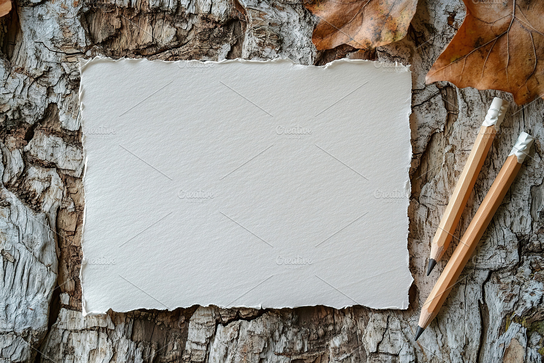 Wrinkled sheet of paper on wooden table, a Background Photo by AlyaAnd