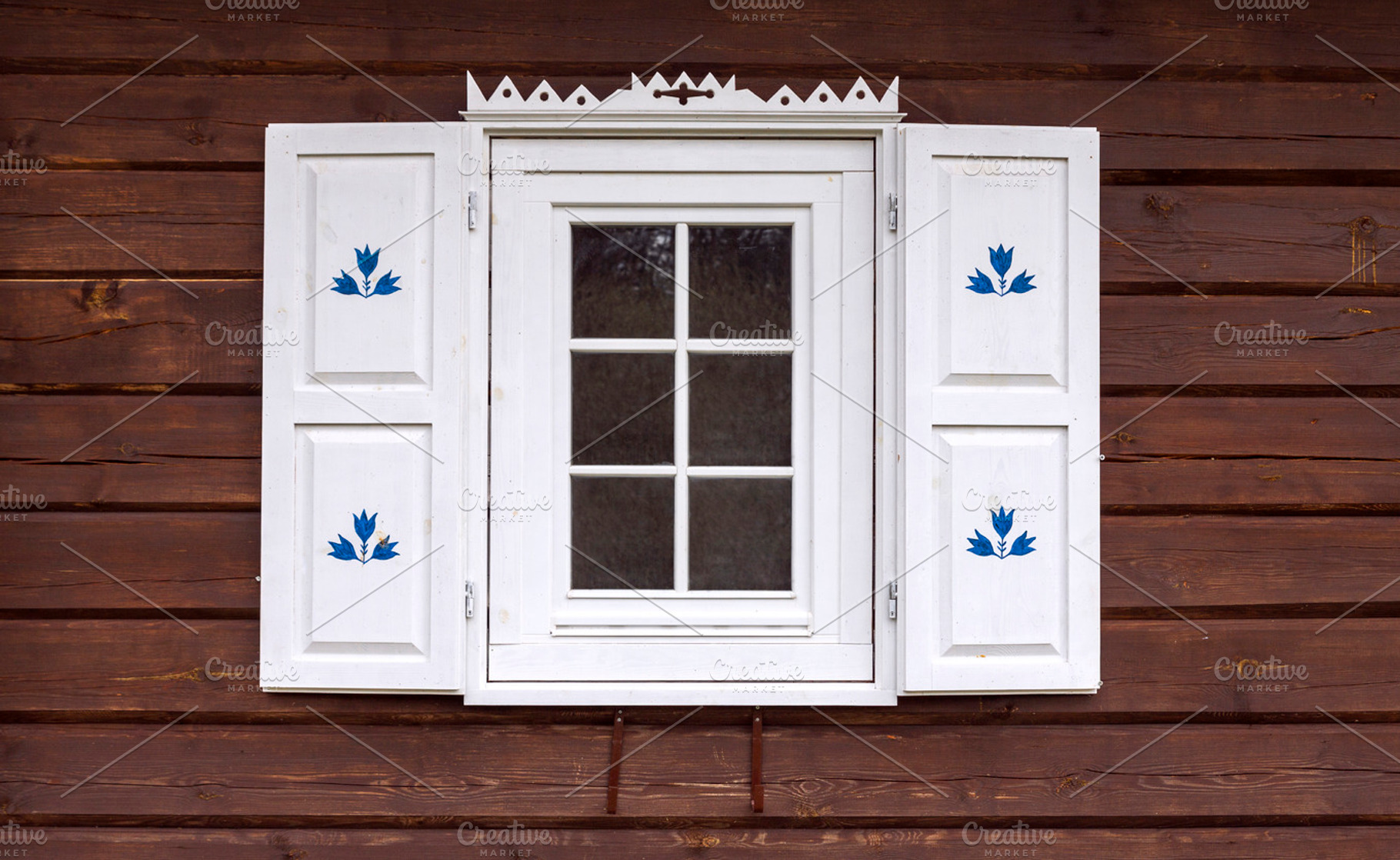 Log house with decorated window, an Architecture Photo by BOOCYS