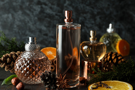 Concept of fragrant flavored perfume, close up, a Beauty & Fashion Photo by AtlasStudio