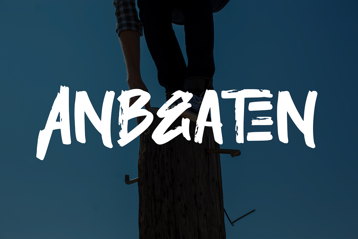 ANBEATEN - Handwritten Brush Font, a Script Font by NTC Graphic (Photo 1 of 8)