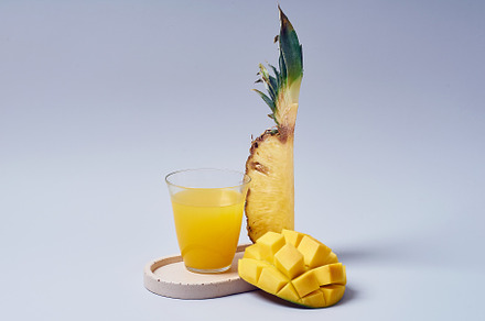 Tropical fruits variety on a colorful background. Side view with