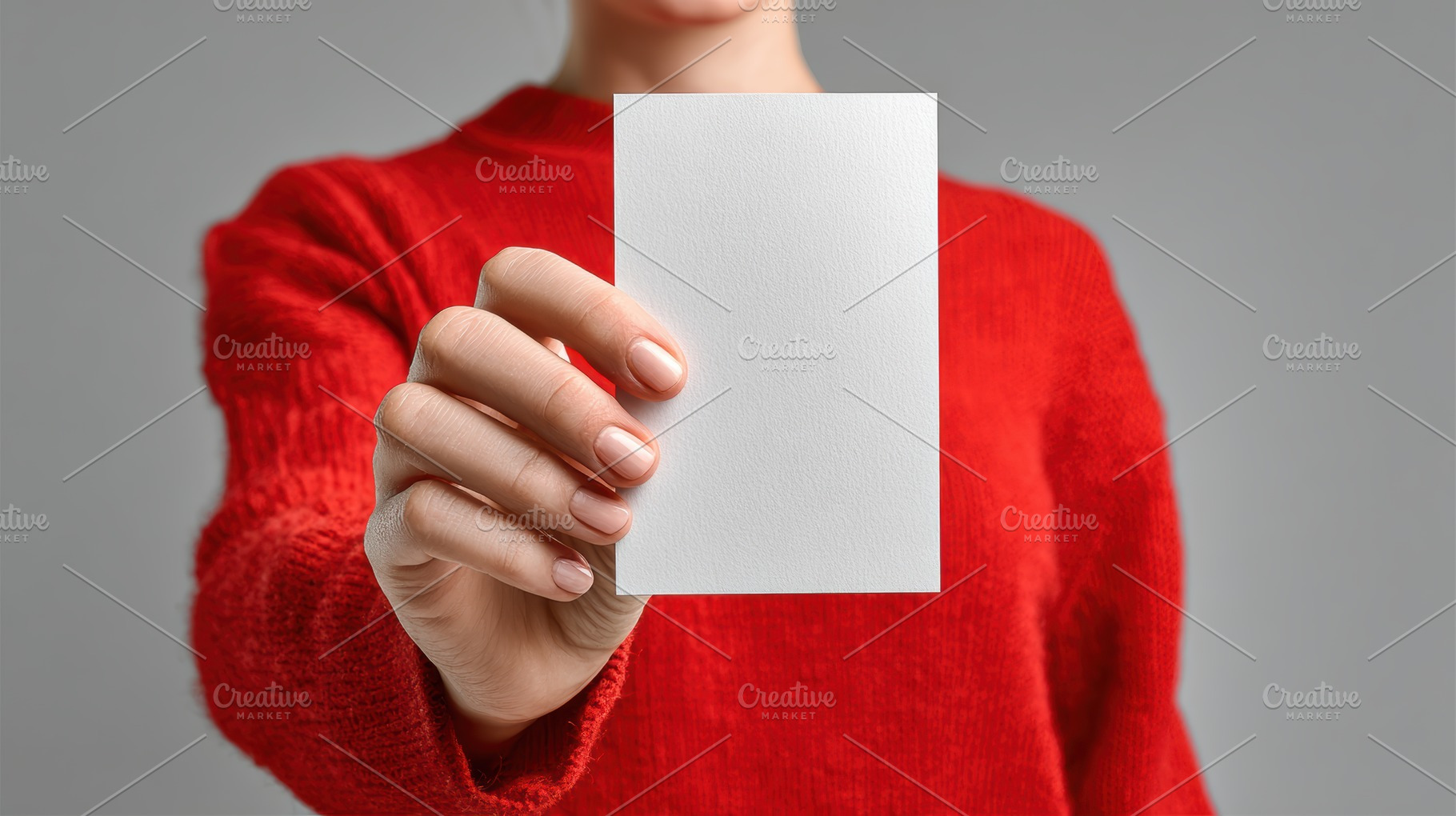 Vertical Postcard Mockup in Hand, a Person Photo by Virgo Studio
