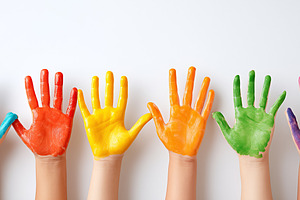 Row of children's hands covered in, a Person Photo by MistyDay