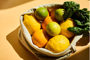 Fresh citrus fruits and basil, a Food & Drink Photo by IlliaBondarPhotography