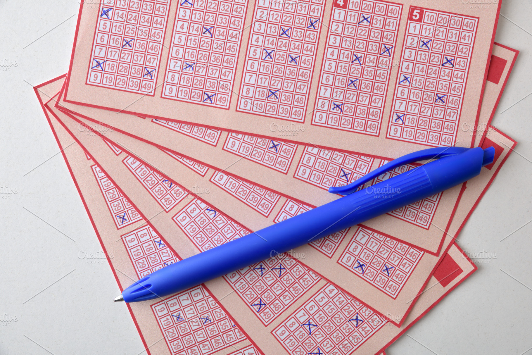 Lottery Tickets and Blue Pen for Number Selection, a Sports & Recreation Photo by Davizro's Market