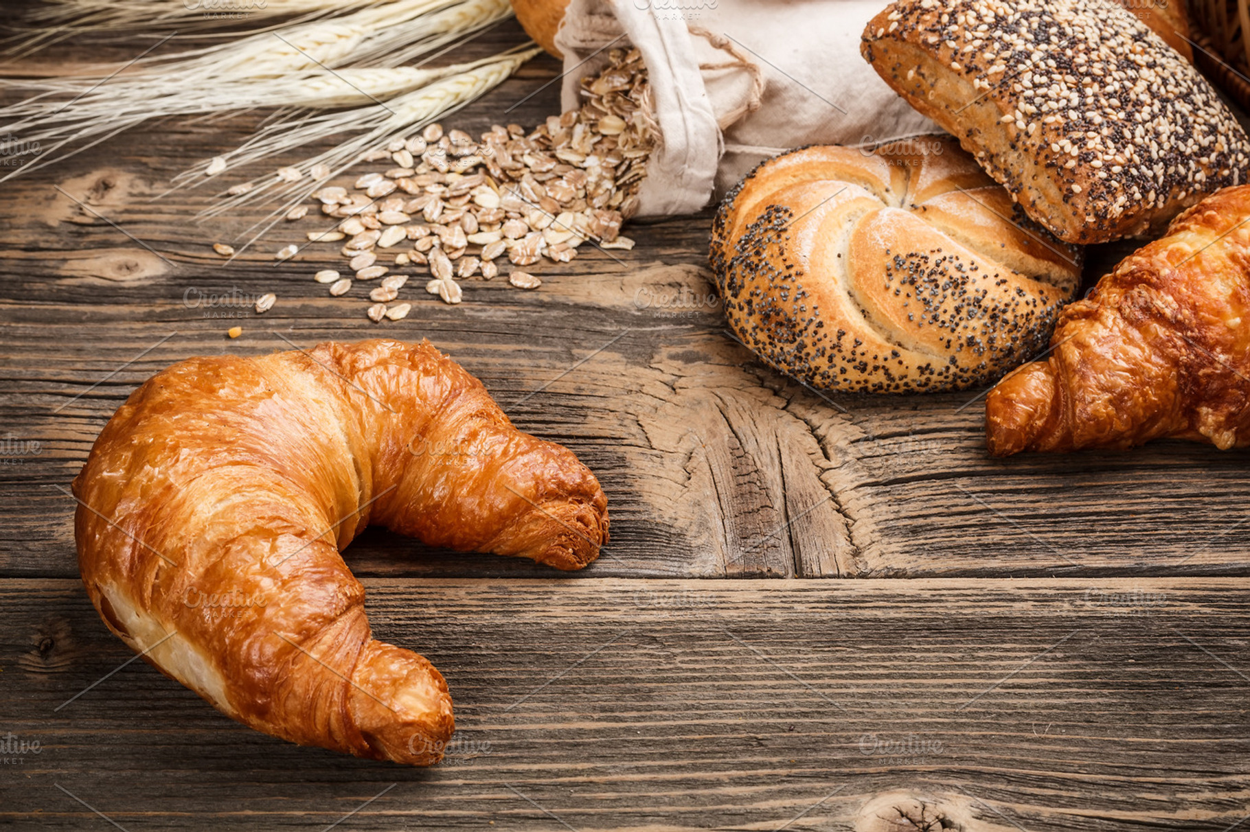 Fresh and tasty croissant containing assortment, baguette, and bakery