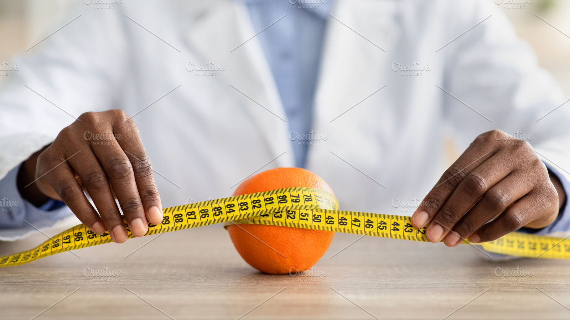 Cellulite is consequence of poor nutrition. African american nutritionist holdi, a Person Photo by Prostock-Studio