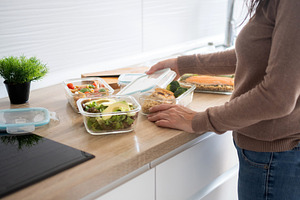 Woman Preparing Healthy Weekly Meal Prep Containers, a Food & Drink Photo by etorres69