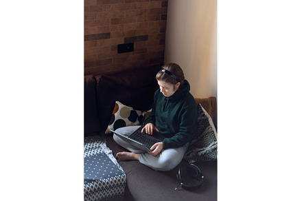 Teenager girl with laptop in, a School & Education Photo by MAnuta