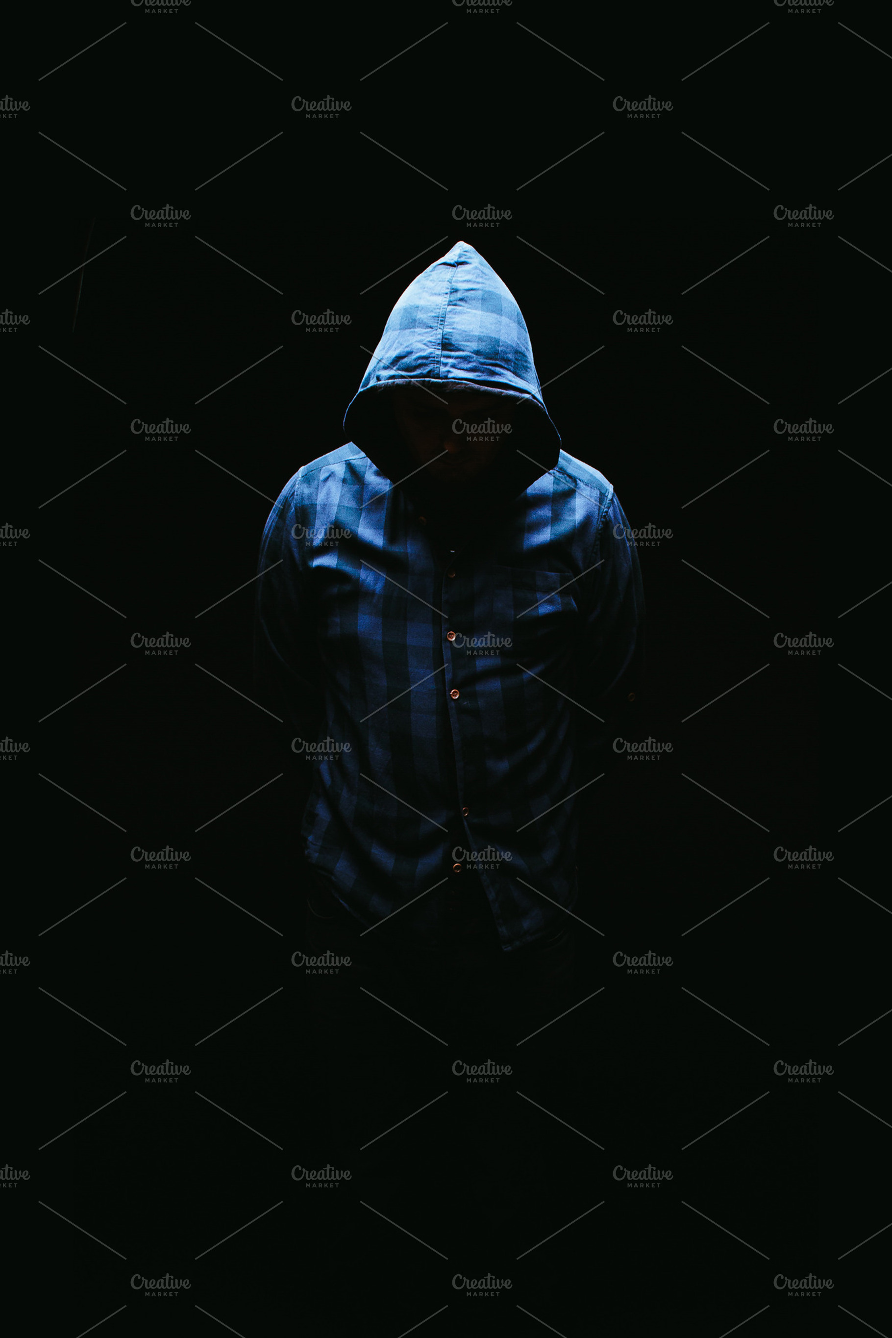 Hood containing hood, shirt, and blue, a Person Photo by Pawel Kadysz