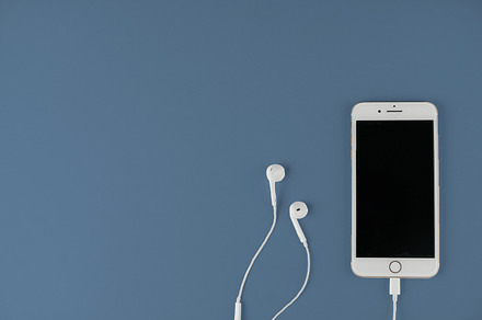 Earbuds containing ipod, earbuds, and podcast