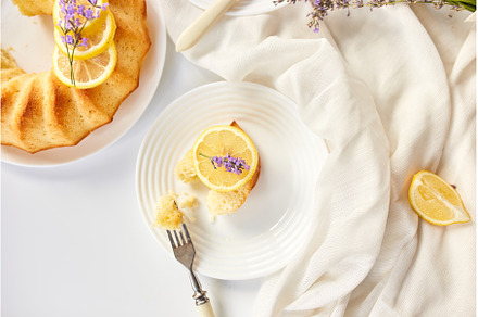 Top view Piece of lemon cake on, a Food & Drink Photo by IlliaBondarPhotography