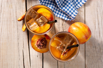 Glass of peach tea with ice cubes, a Food & Drink Photo by etorres69