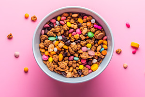Colorful dog food with vitamins in white bowl, a Food & Drink Photo by Photostock